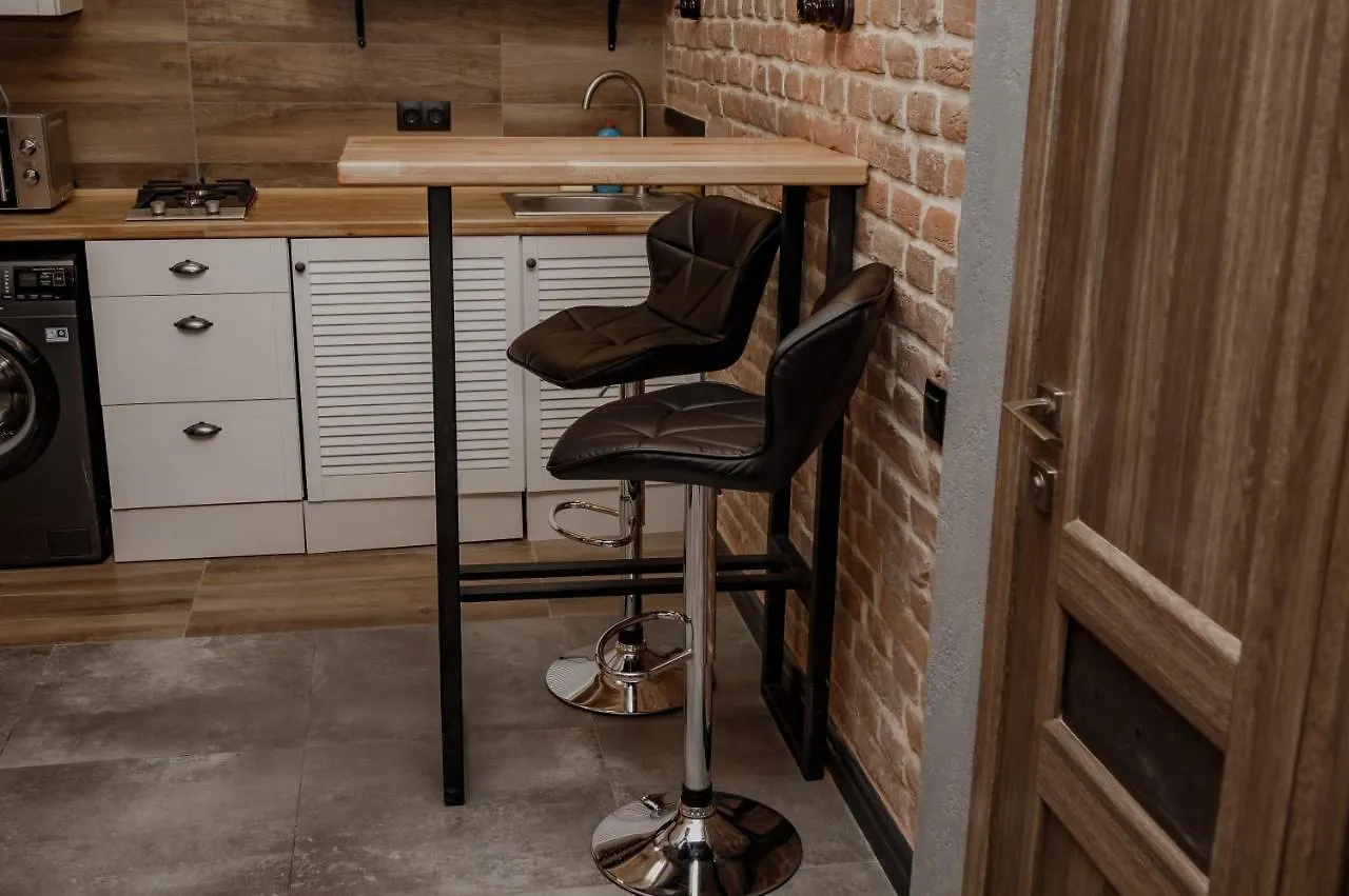 Warm Brick Wall Apartment Lviv